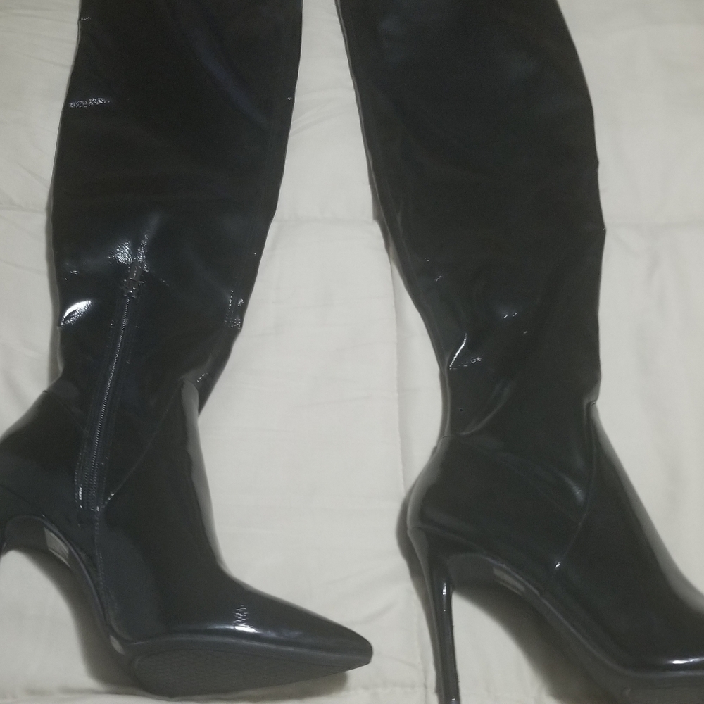 Black patent leather thigh high boots